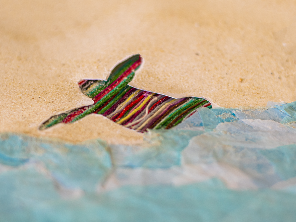 Yarn Turtle on an arts and crafts seaside scenery